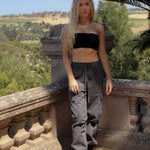 cargo pants, cargo jeans, parachute pants, charcoal pants, streetwear style, streetwear vibe, streetwear aesthetic, ootd, matching set, cool girl style, affordable clothing, affordable pants, black jeans, black cargos, 90s style, Rachel green cargo pants, Rachel friends cargo pants, Rachel friends pants, Rachel from friends style, Rachel green clothes, friends clothes inspo, black pants, black matching set, charcoal matching set, streetwear matching set